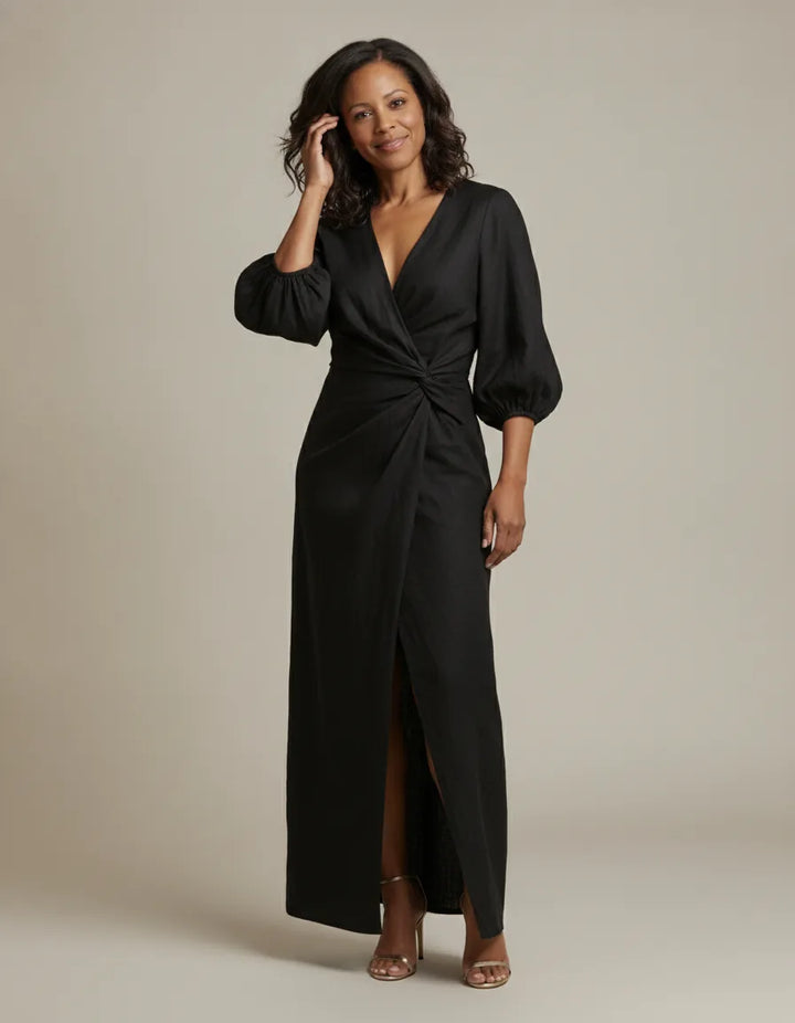 Embrace timeless style and breathable all-day comfort with the Genevieve maxi dress. — Black